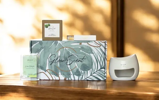 Gel Wax P2 A stylish wax melt gift set arranged on a wooden surface with warm, dappled sunlight.